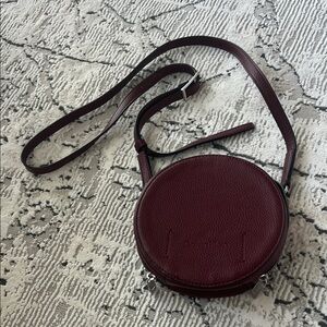 Calvin Klein Dark Red Round Crossbody Bag